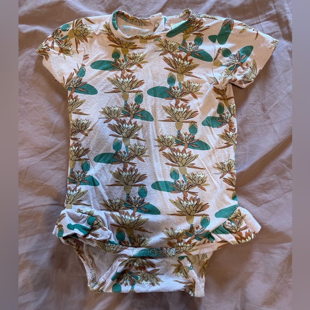 Kate Quinn Onesie